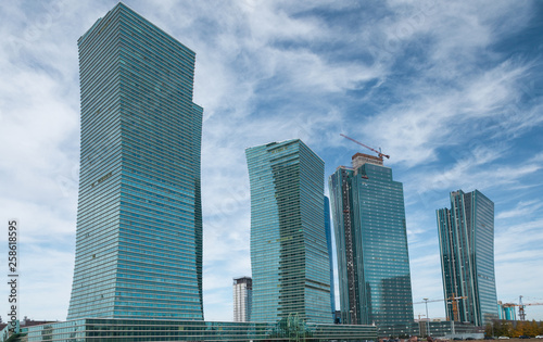 Skyscrapers of Emerald Quarter under construction in the sky  at he NurZhol boulevard  Nur-Sultan  Astana. Nur-Sultan is the capital city of Kazakhstan and the second-largest city in country.