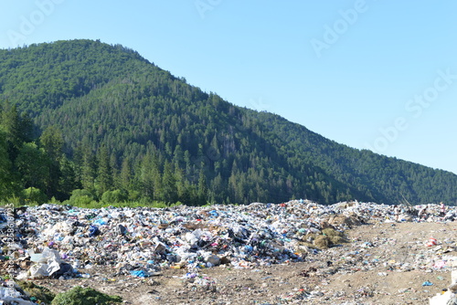trash in the mountains. save the earth