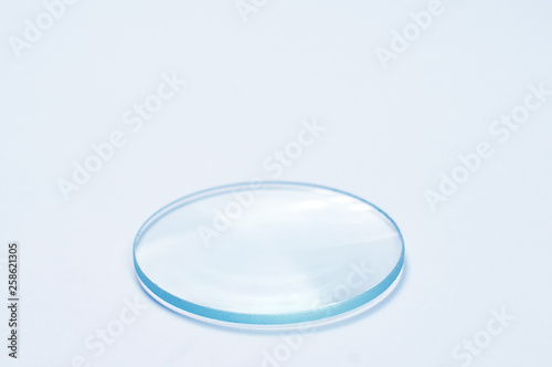 magnifying glass lens on white background close-up photo