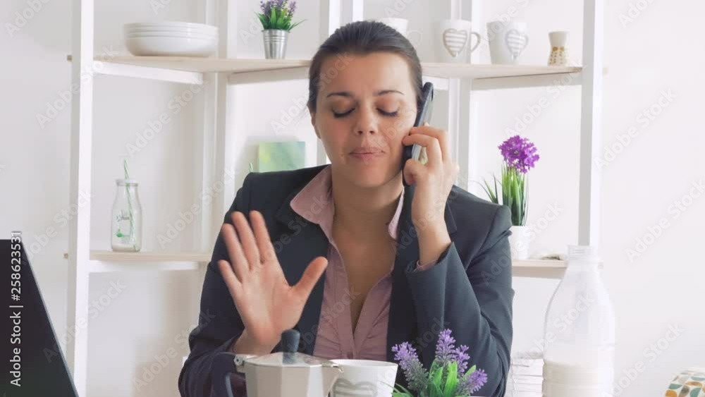 Happy woman in the morning drinking coffee talking on the phone Happy woman in the morning drinking coffee talking on the phone