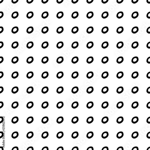 Abstract polka dot pattern with hand drawn dots. Cute vector black and white polka dot pattern. Seamless monochrome polka dot pattern for fabric, wallpapers, wrapping paper, cards and web backgrounds. © penarulit