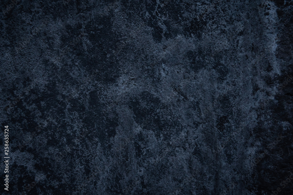 Closeup of dark grunge textured background