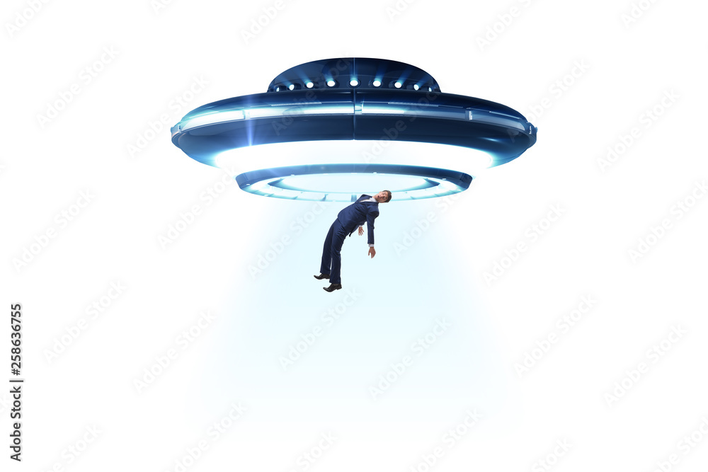 Flying saucer abducting young businessman Flying saucer abducting young businessman