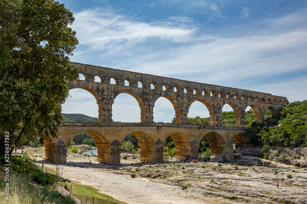 The magnificent three tiered Pont Du Gard aqueduct was constructed by Roman engineers in the 1st century AD in the south of France