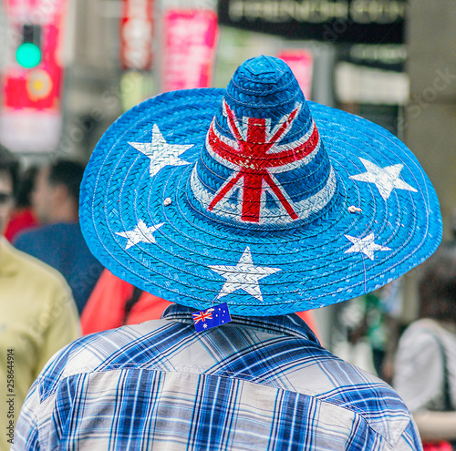 Austarlian day, one Australian man is working on the main street of Sydney Australia with other people  photo