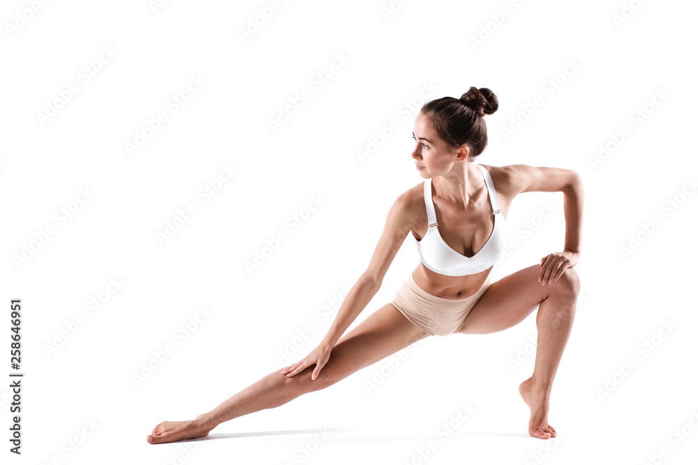 Woman doing yoga or sports exercises, isolated on white. Woman doing yoga or sports exercises, isolated on white.