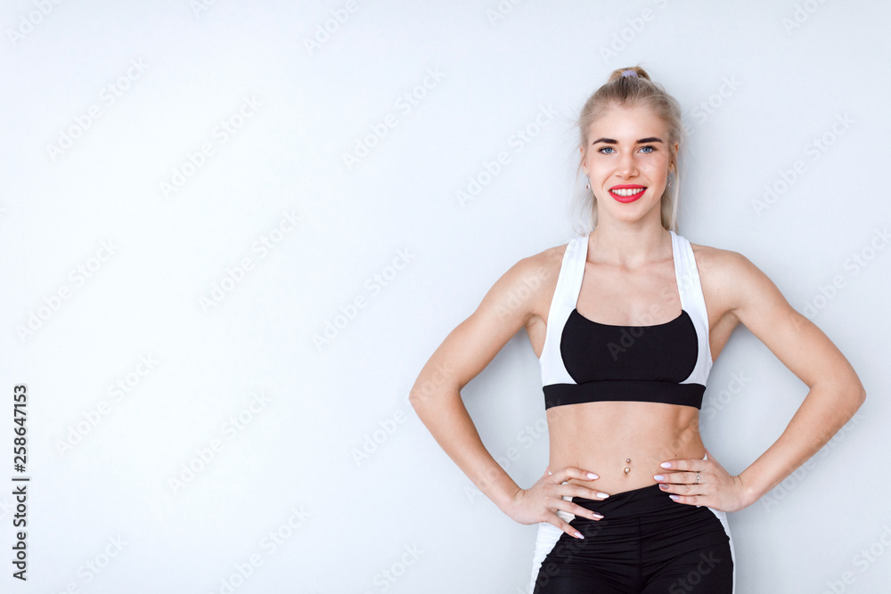 Portrait of a beautiful athletic woman in sportswear. Portrait of a beautiful athletic woman in sportswear.