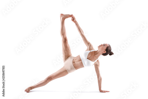 Yoga woman doing exercises isolated.