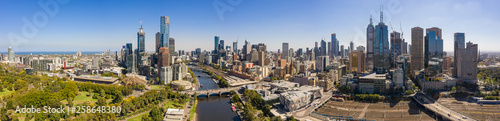 Panoramic view of the beautiful city of Melbourne as captured from above the Yarra river on a summer day © Michael Evans