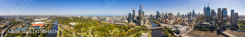 Panoramic view of the beautiful city of Melbourne as captured from above the Yarra river on a summer day © Michael Evans