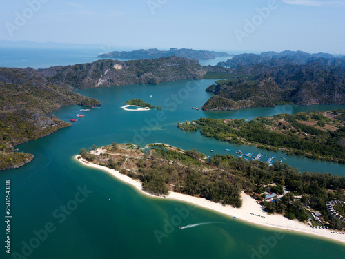 Aerial view of Kilim Geoforest Park. There is sea, river, coastline, mangroves and mountains on the photo. Langkawi, Malaysia. © dimabucci