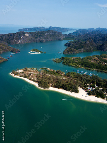 Aerial view of Kilim Geoforest Park. There is sea, river, coastline, mangroves and mountains on the photo. Langkawi, Malaysia.