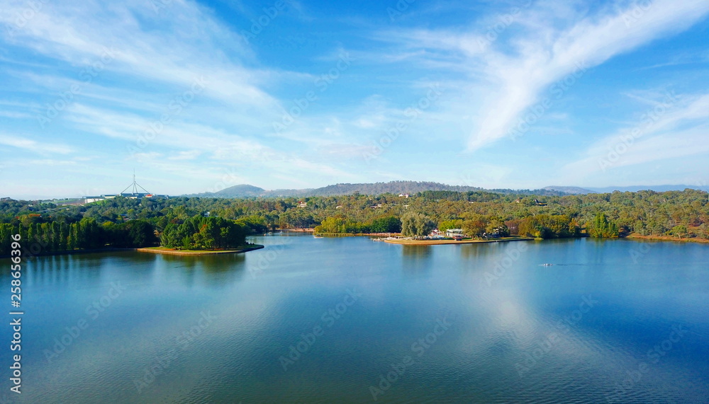 Panoramic view of Canberra (Australia) in daytime, featuring Lake Burley Griffin and Parliament House. Panoramic view of Canberra (Australia) in daytime, featuring Lake Burley Griffin and Parliament House.