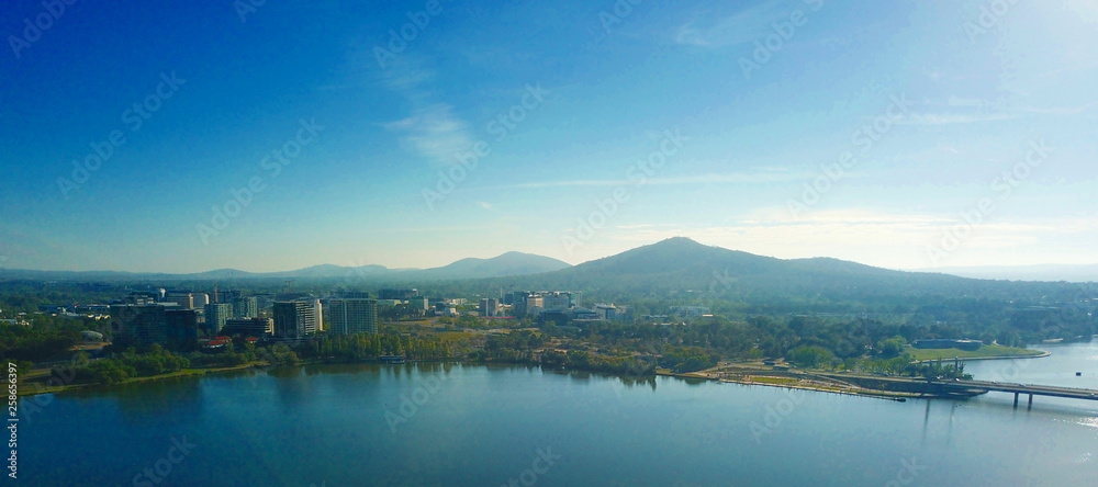 Panoramic view of Canberra (Australia) in daytime, featuring Lake Burley Griffin, Molonglo River, Mount Ainslie.