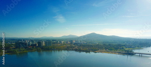 Panoramic view of Canberra (Australia) in daytime, featuring Lake Burley Griffin, Molonglo River, Mount Ainslie. photo