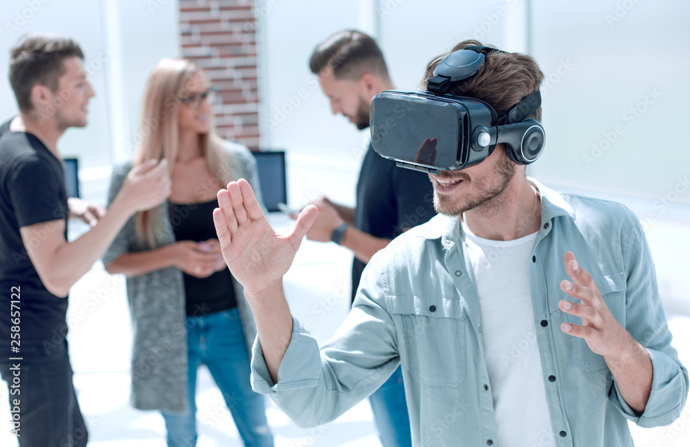 Young men with virtual reality goggles Young men with virtual reality goggles