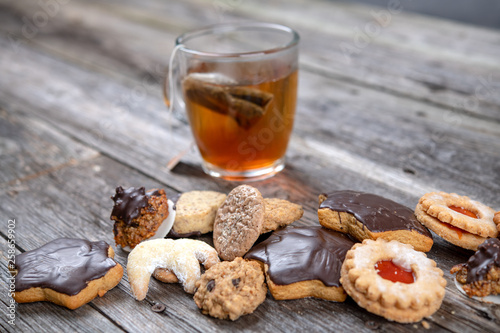 different homemade cookies with cup of tea