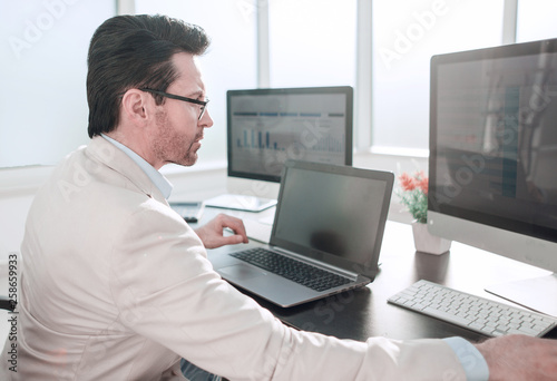 businessman using modern technologies for financial data processing