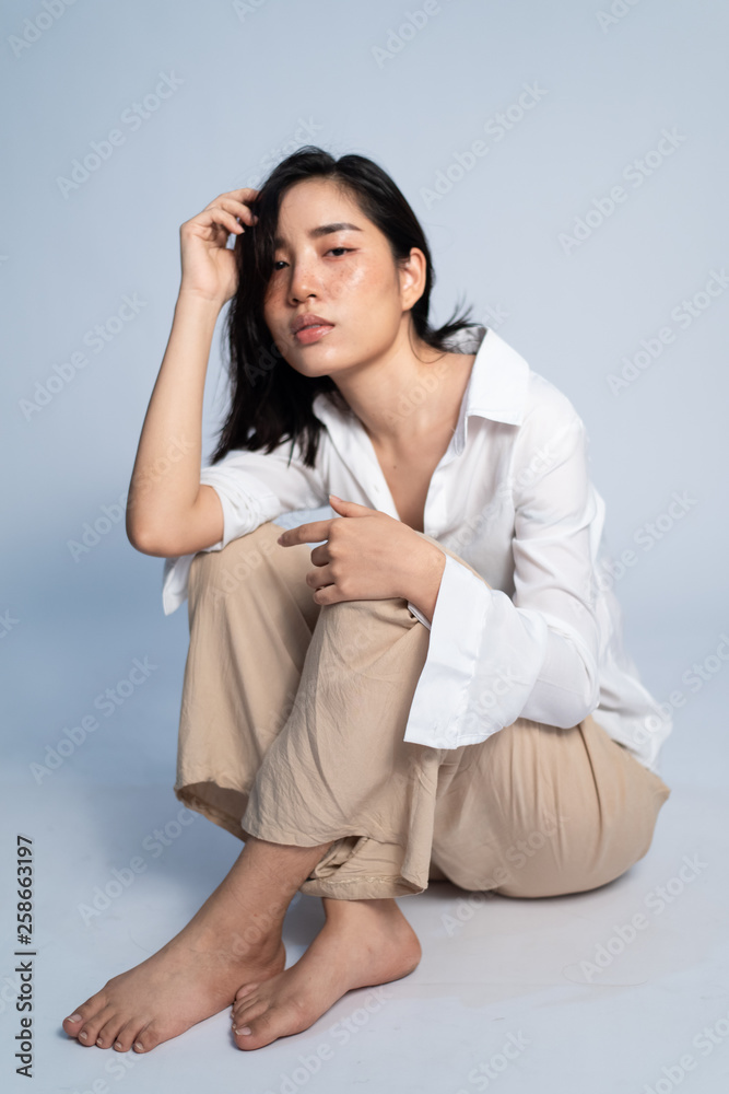 Portrait young Asian girl on white background. Portrait young Asian girl on white background.