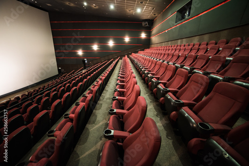 Empty cinema auditorium. Mock up.part of a theatre, or similar building, where the people who are watching and listening sit