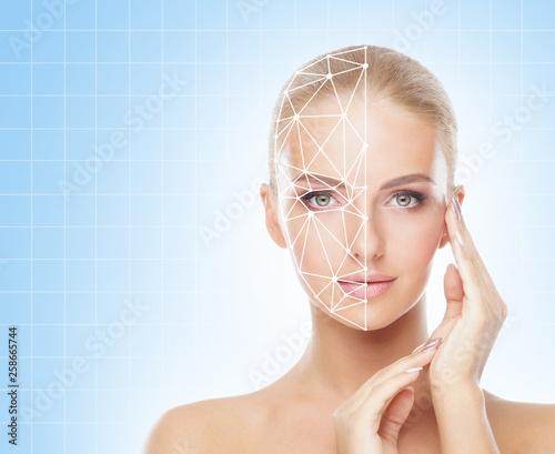 Portrait of attractive woman with a scnanning grid on her face. Face id, security, facial recognition, future technology.