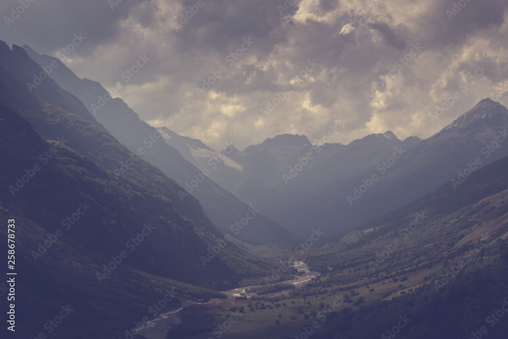 Fototapeta premium Panorama view on mountains with river scene in national park of Dombay