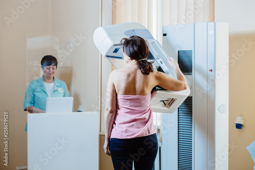 A woman patient having mammography examination at hospital. photo