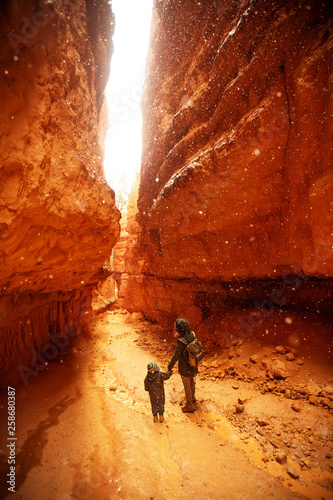 Mother with son are hiking in Bryce canyon National Park, Utah, USA