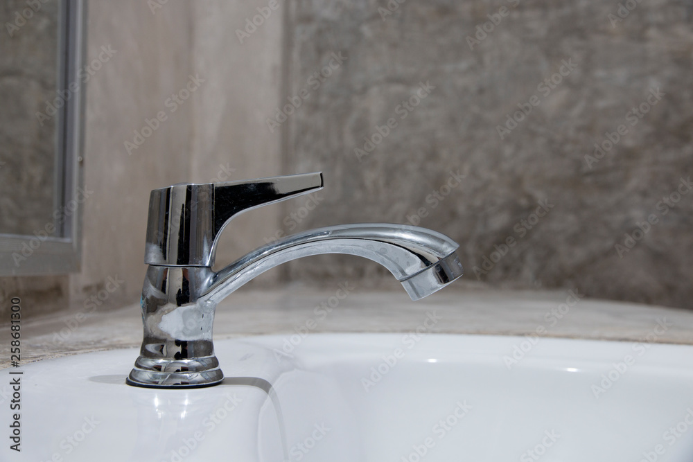 Water tap, faucet in the bathroom.