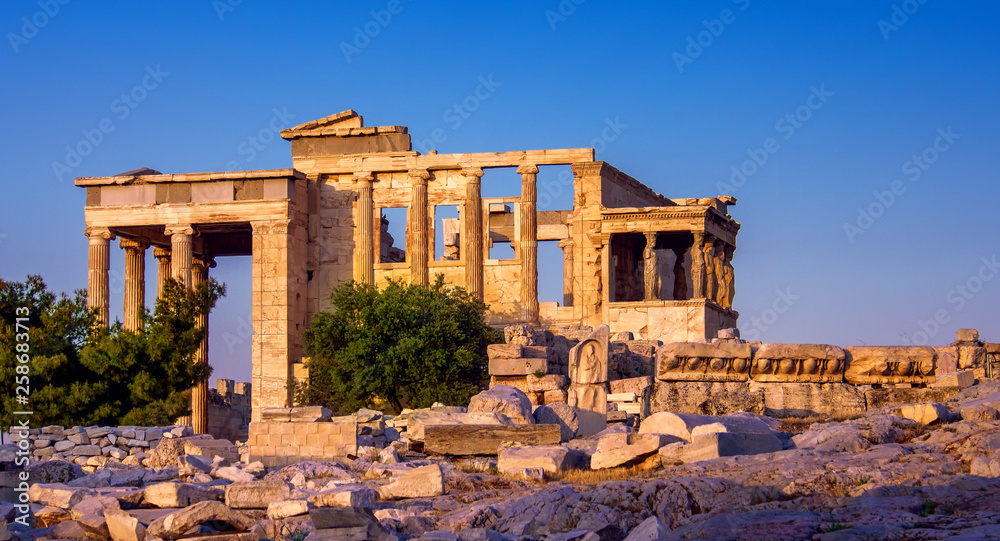 View of Erechtheion and porch of Caryatids on Acropolis, Athens, Greece, at sunset