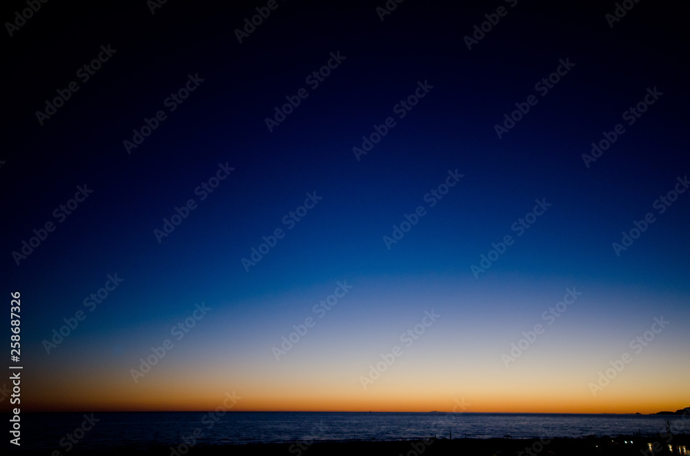 Fototapeta premium beautiful sunsets over the Tuscan sea