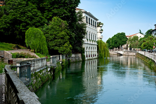 The river Sile flows between the coast of Santa Margherita and the Riviera Garibaldi in Treviso, the city of many canals. Veneto, Italy photo