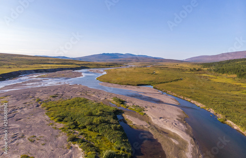 Top view landscape with a river and clouds, Yamal, Polar Urals, Russia