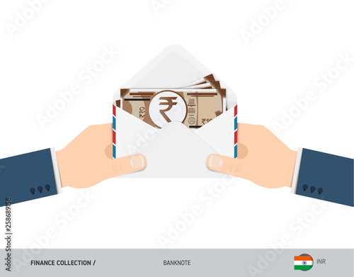 10 Indian Rupee Banknotes in envelope hold in hand. Flat style opened white envelope with cash. Salary payout or corruption concept.