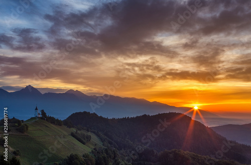Bild auf Leinwand St. Primoz church in Yamnik at sunrise, Slovenia