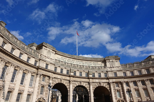 Photo from iconic Admiralty Arch near Trafalgar square on a cloudy blue sky, London, United Kingdom                     photo