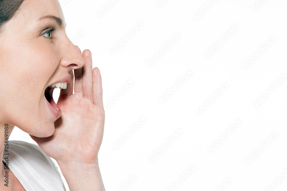 Woman shouting - profile - copy space - isolated - close up on face Woman shouting - profile - copy space - isolated - close up on face