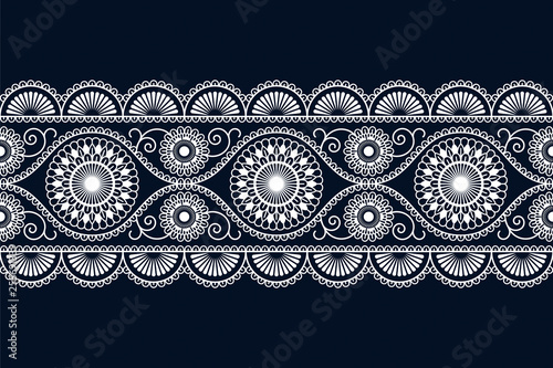 seamless vector white ethnic ornamented border design with flowers. seamless template in swatch panel
