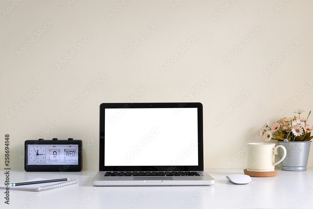 Fototapeta premium Office desk Workspace stuff with notepad, laptop and coffee cup mouse notepad shot.