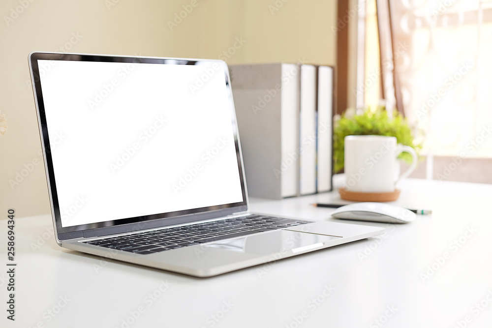 Workspace desk and mockup laptop. copy space and blank screen. Business image, Blank screen laptop and supplies. Workspace desk and mockup laptop. copy space and blank screen. Business image, Blank screen laptop and supplies.