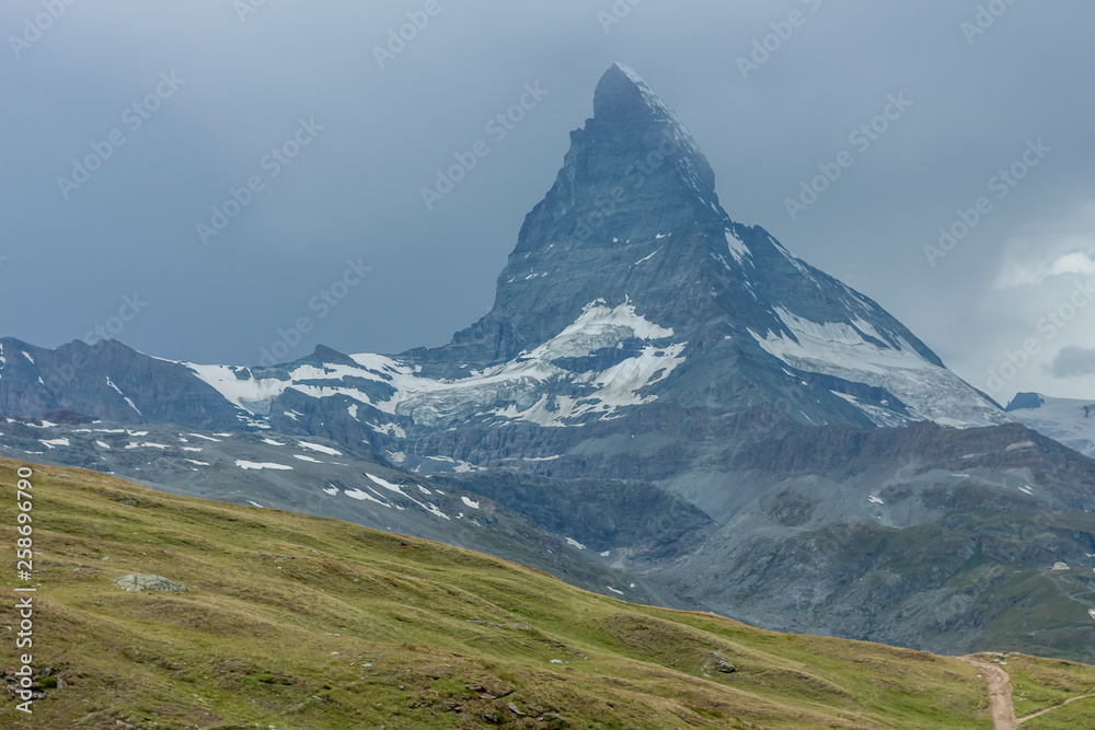 summer landscape with Matterhorn mount and glaciers Swizerland Alps
