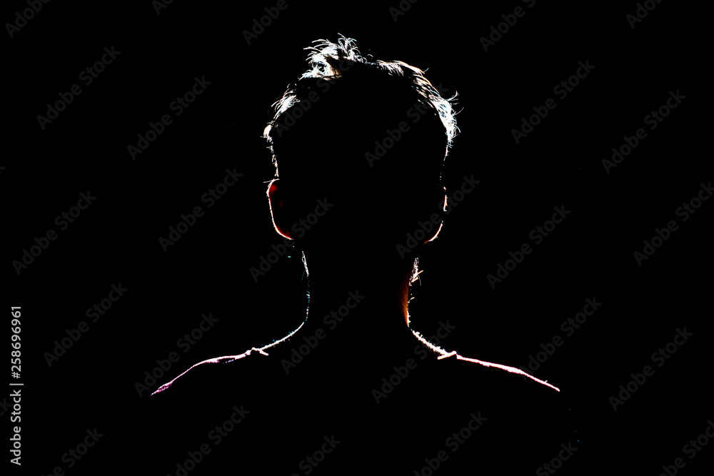silhouette of man in dark place, anonymous backlit contour a - obrazy, fototapety, plakaty 