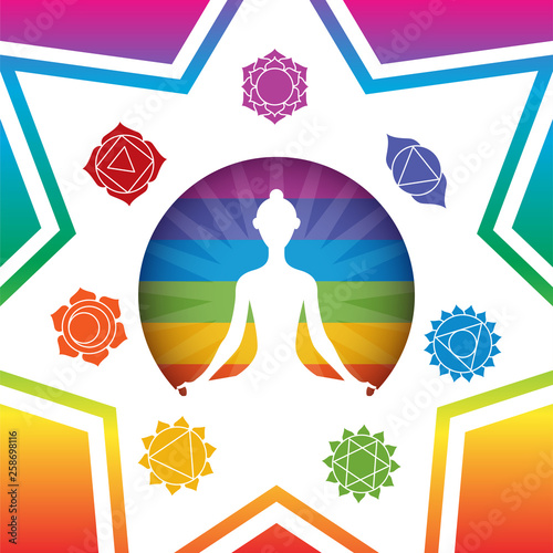 Meditating yoga girl silhouette with chakras signs in shining colorful circle on colorful gradient rainbow background