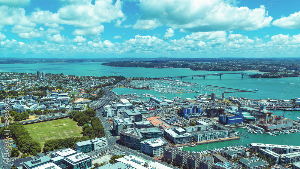 Auckland bridge and harbour view from observation deck on a sunny day