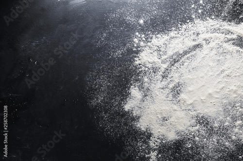 Flour on the table background