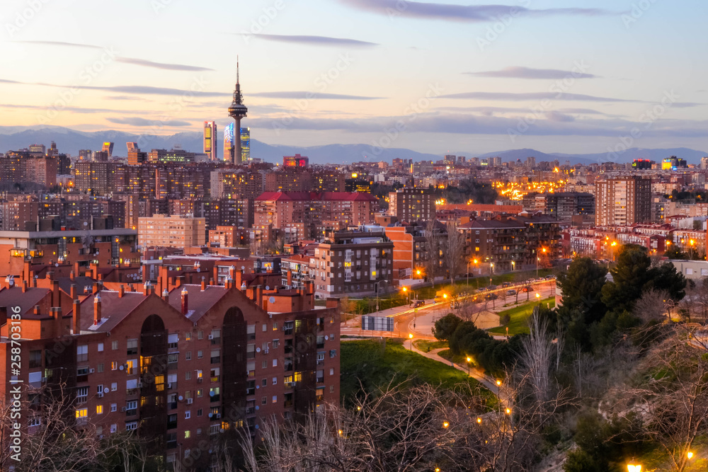 Madrid Skyline view From Cerro del Tio Pio (Siete Tetas Park) during the evening. Vallecas, Madrid, Spain