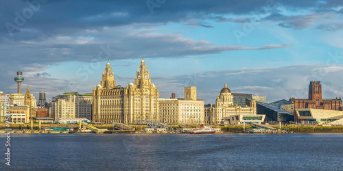 Liverpool skyline, ferry across the Mersey, iconic historical buildings photo