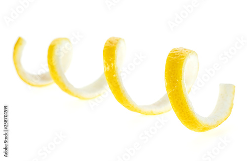 Lemon twist on a white background. Selective focus.