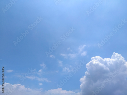 White soft cloud texture on blue sky background © At My Hat