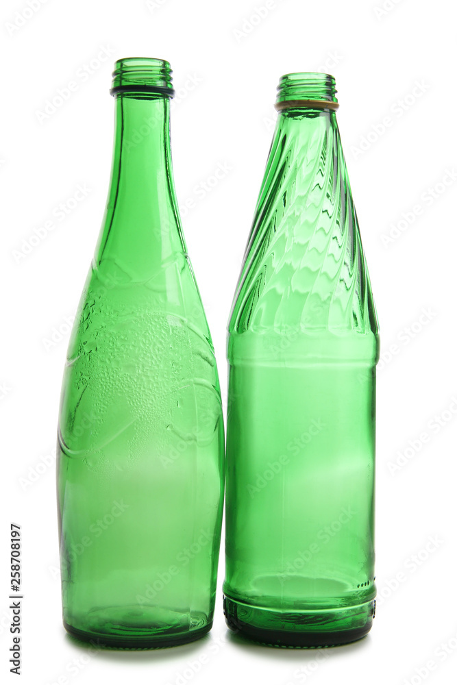 Bottle and glasses of water on white background Bottle and glasses of water on white background
